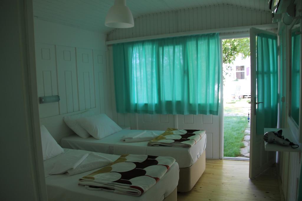 Defne Pension Чирали Номер фото